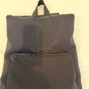 Athleta black back pack with many pockets ( women or men’s)